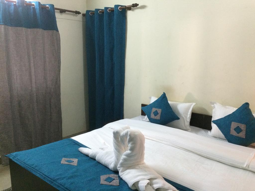 Hotel Sukhsadan Деградун Номер фото